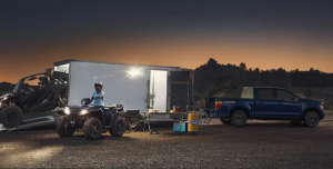A 2025 Ford F-150 that's just parked after towing a container with ATV's in it near Anderson, Indiana