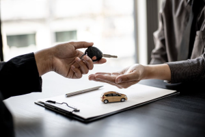 A person discussing auto financing at their Ford dealership near Anderson, Indiana