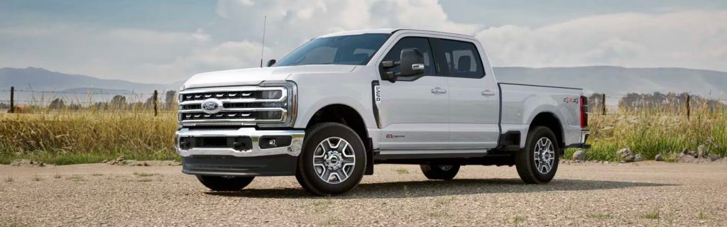 2025 Ford F-250 Super Duty truck parked outdoors showcasing bold front grille, rugged design, and off-road capability
