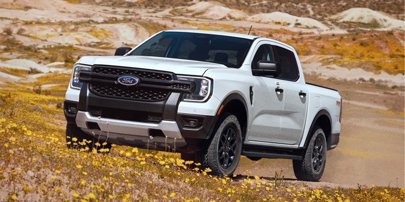 White 2025 Ford Ranger off-roading 