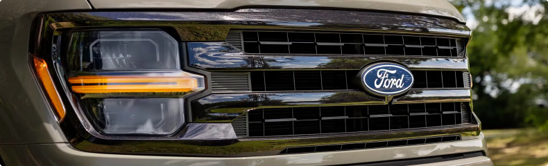 Close-up of the grille, Ford badge and headlamp on a Ford F-150