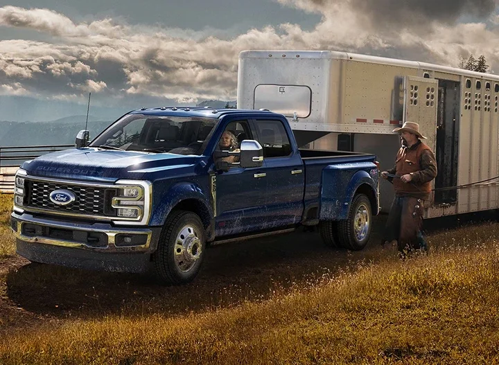 Ford Super Duty dually towing a livestock trailer