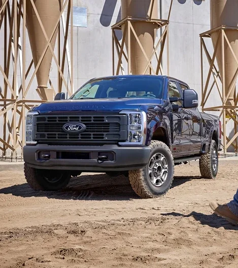 Ford Super Duty Crew Cab at work in a sand and gravel yard
