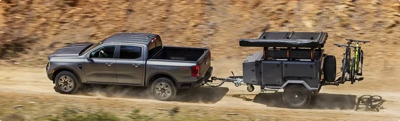A 2025 Ford towing a trailer on a Central Indiana road near Anderson
